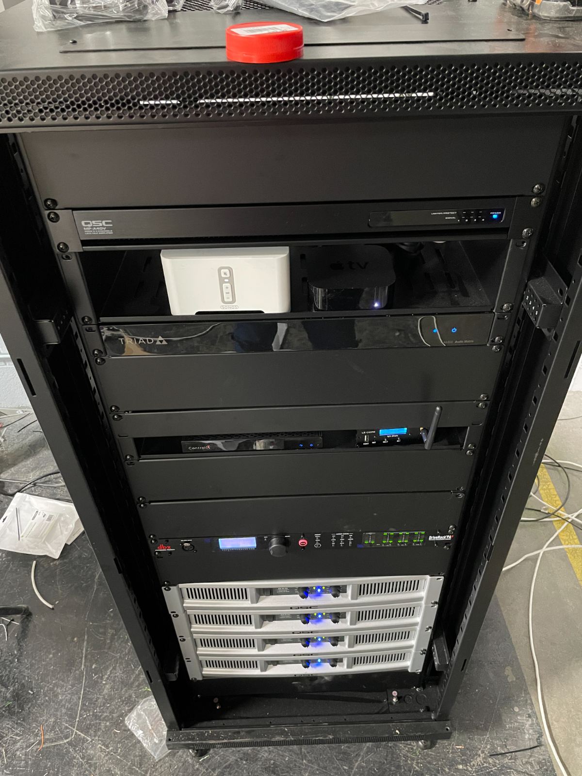 An open equipment rack on the studio floor